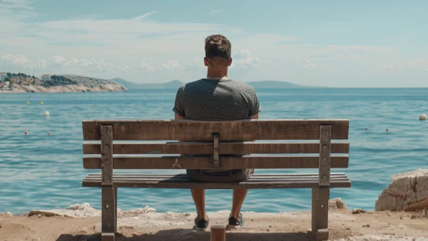 Man relaxing at the beach enjoying the simple life