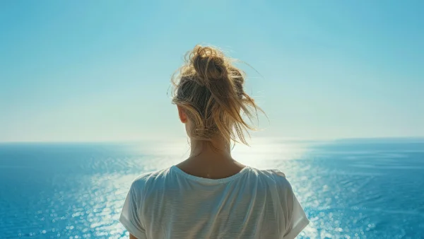 Woman looking out to sea